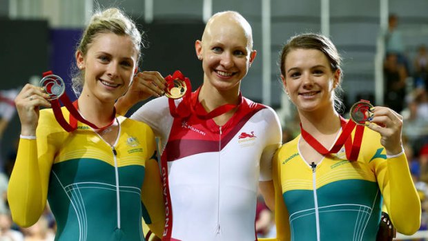 From left: Silver medalist Annette Edmondson of Australia, gold medalist Joanna Rowsell of England and bronze medalist Amy Cure of Australia pose on the podium after the Women's 3000 metres Individual Pursuit final at Sir Chris Hoy Velodrome.