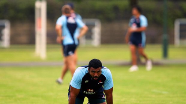 Bring it on  ... Wycliff Palu, resting after training at Victoria Barracks yesterday, is looking forward to the Waratahs striking up a rivalry with the Rebels.