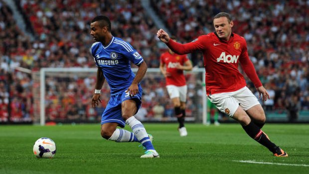 Centre of attention: Manchester United star Wayne Rooney up against Chelsea defender Ashley Cole.