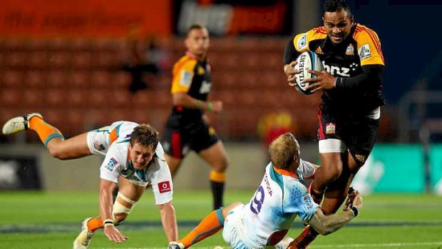 Lelia Masaga of the Chiefs is tackled by Sarel Pretorius of the Cheetahs.