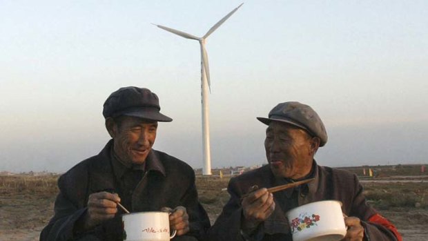 Winds of change ... workers on site in Wuzhong country.