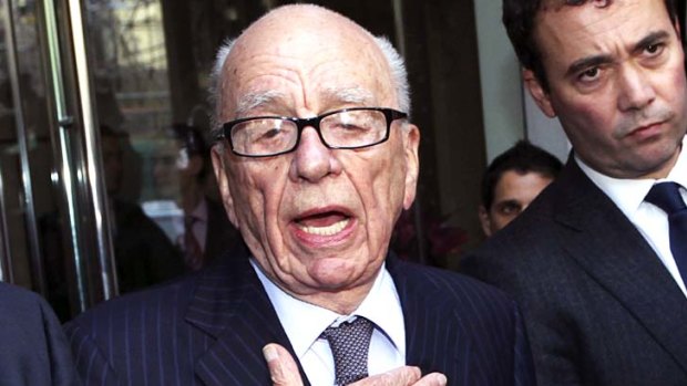 Rupert Murdoch, chairman and chief executive officer of News Corp, speaks to the media in London after meeting with victims of criminal phone hacking.