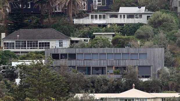 Fortress ... Pink's northern beaches rental home (foreground).