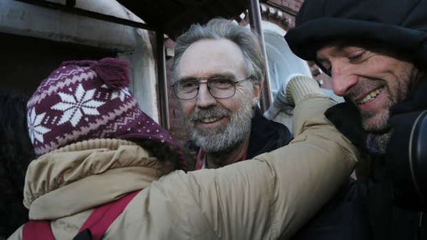 Relief ... Colin Russell of Australia, one of the 30 people who were arrested over a Greenpeace protest at the Prirazlomnaya oil rig, is greeted as he is released on bail from prison in St. Petersburg.