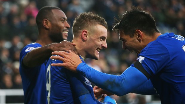On a streak: Jamie Vardy celebrates scoring his team's first goal with his teammates during the Premier League match between Newcastle United and Leicester City at St James' Park.
