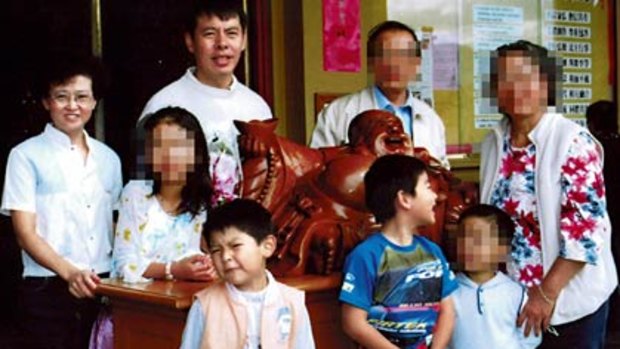 Clockwise from left, Lillie, Min, Mr Lin’s parents and nephew (all obscured), Henry, Terry and Brenda (obscured) in 2005.
