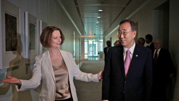 Follow the leader ... UN Secretary-General Ban Ki-moon meets Ms Gillard at Parliament House.