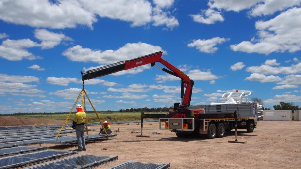 Renewables on the move: Contractors instal a mobile solar farm at New Century Resource's zinc mine and processing plant site, 250 kilometres northwest of Mt Isa, Queensland.