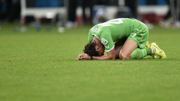 The pain of loss ... Algeria's midfielder Mehdi Mostefa reacts at the end of a Round of 16 loss to Germany. Algeria almost upset one of the World Cup favourites, going down 2-1 in extra time.