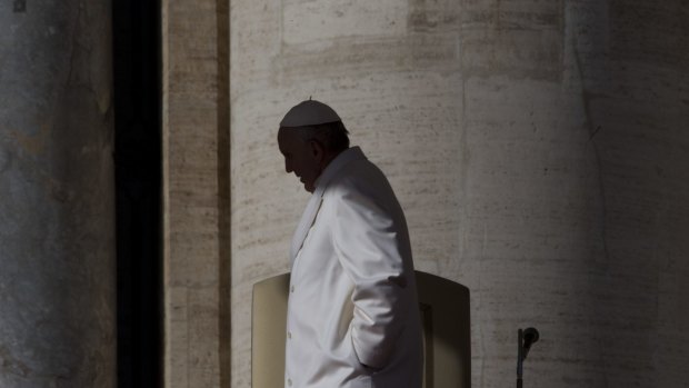 Pope Francis arrives for an audience with prayer groups of Saint Pio in St Peter's Square at the Vatican on Friday.