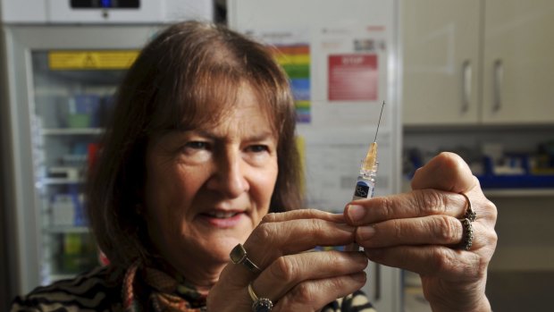 Dr. Suzanne Davey prepares an immunisation needle at the Kambah Village Medical Practice.