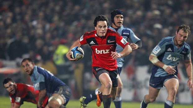 Zac Guildford makes a break for the Crusaders.