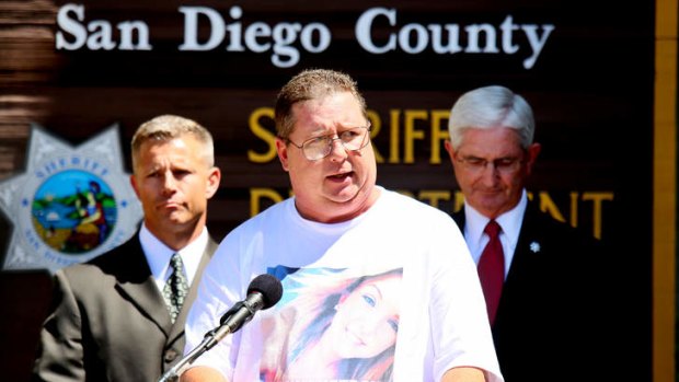 Brett Anderson speaks to members of the media during a news conference.