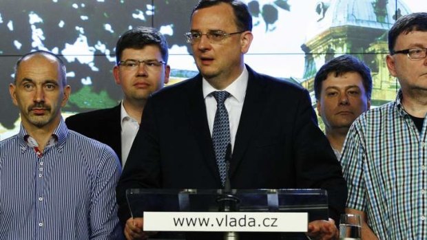 Victim of scandals: Czech Prime Minister Petr Necas announces his resignation at a news conference at the government headquarters in Prague on Sunday.