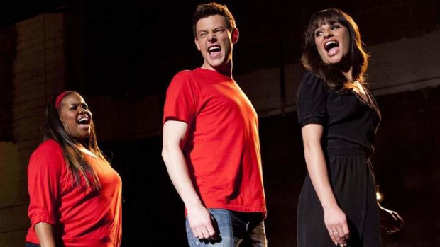 <i>Glee</i> cast members, from left, Amber Riley, the late Cory Monteith and Lea Michele.