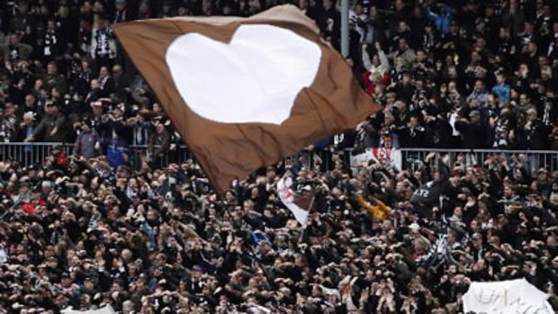 A long-time loser, FC St Pauli delights fans by promotion to the German Bundesliga.