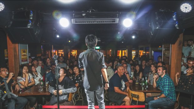 On stage at Comedy Masala, Singapore. 