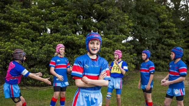 Jack Rattenberg, 12, who plays for the Engadine Dragons junior rugby league Under 12B team, wears a custom-fitted mouthguard. 