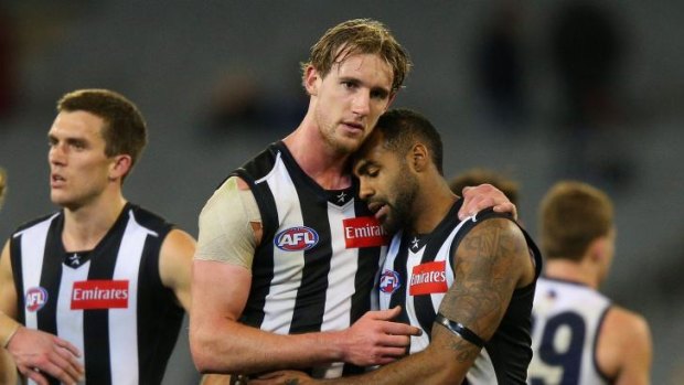 Laclhlan Keeffe consoles Heritier Lumumba after the Pies' loss.