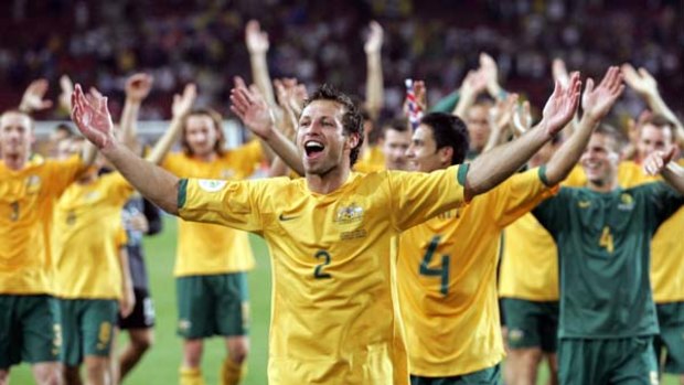 High point ... Lucas Neill leads the Socceroos on a lap of honour after a 2-2 draw with Croatia secured passage to the second round in Germany four years ago. Australia must recapture the spirit of 2006 to overcome Ghana tonight.