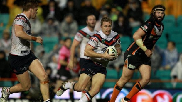 Rampant Rooster: Mitch Aubusson in acres of space against the hapless Wests Tigers.