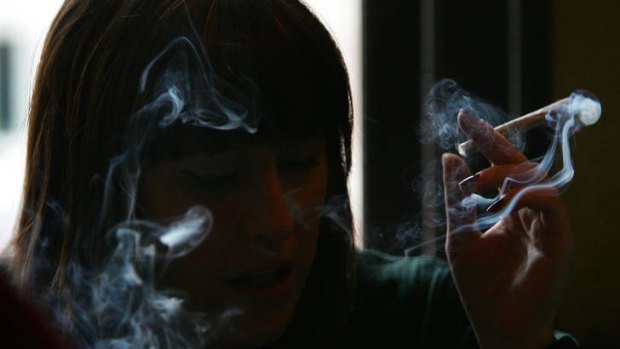 Foreigners will still be allowed to smoke marijuana in Amsterdam cafes for now.
