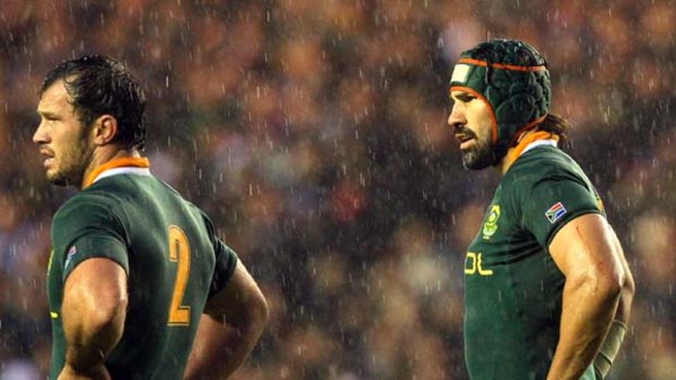 Downbeat . . . South Africa's captain Victor Matfield and hooker Bismarck Du Plessis after being defeated by Scotland.