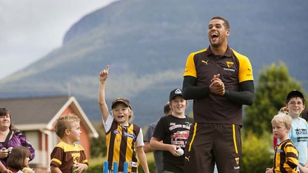 King of the kids: Lance Franklin builds bridges during a community camp in Hobart earlier this year.