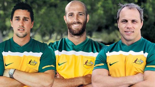 Socceroos fans ... rugby league halfback Mitchell Pearce, Swans star Jarrad McVeigh and former Wallaby Phil Waugh are behind Australia's football World Cup bid.
