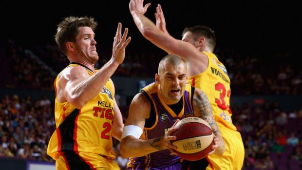 James Harvey of the Kings drives to the basket during the round one NBL match between the Sydney Kings and the Melbourne Tigers at Sydney Entertainment Centre.