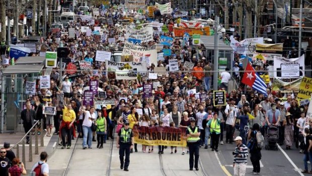 Protesters rally against the Abbott government's policies in Melbourne