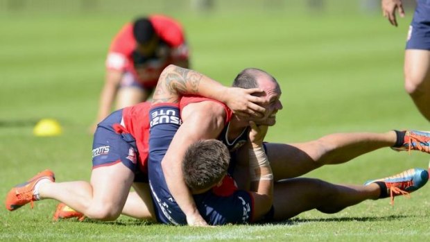 Rooster wrestle:  Heath L'Estrange and Jared Waerea-Hargreaves during a Roosters training session.