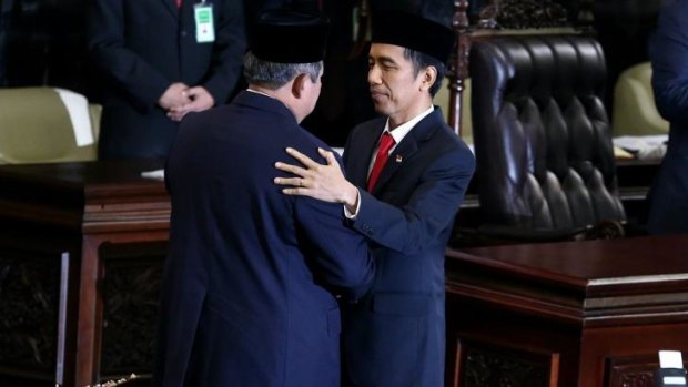 Outgoing president Susilo Bambang Yudhoyono and Joko Widodo.