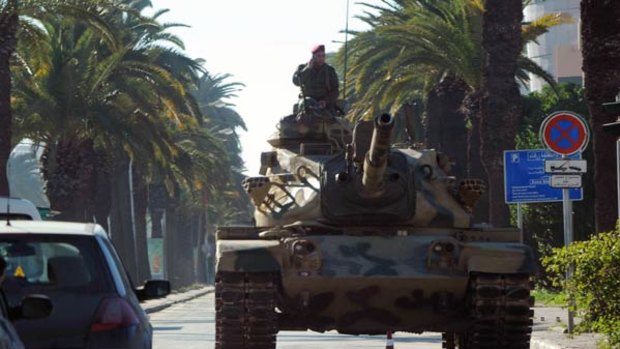 A tank guards a street in Tunis.