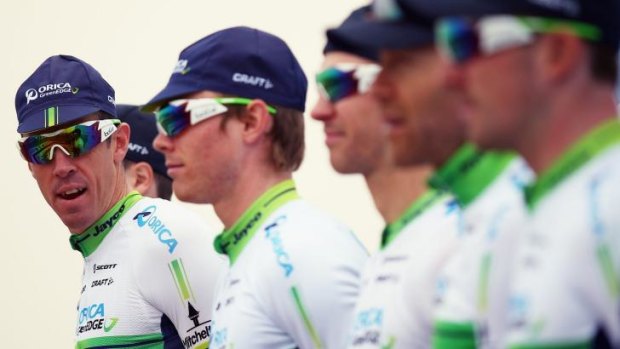 Mathew Hayman, left, with his Orica-GREENEDGE teammates earlier this year.