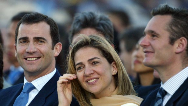 King Felipe of Spain (left) in 2003, with his sister Cristina and her husband Inaki Urdangarin.