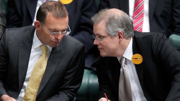 "Making Tony Abbott the issue hasn?t been this government?s forte" ... Opposition Leader Tony Abbott and Immigration spokesman Scott Morrison during question time on Thursday.