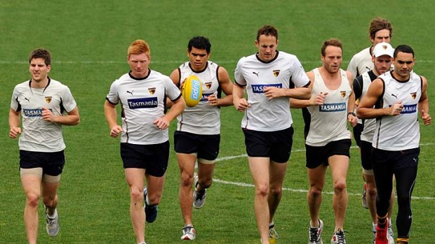 Hawthorn players at a training session yesterday.