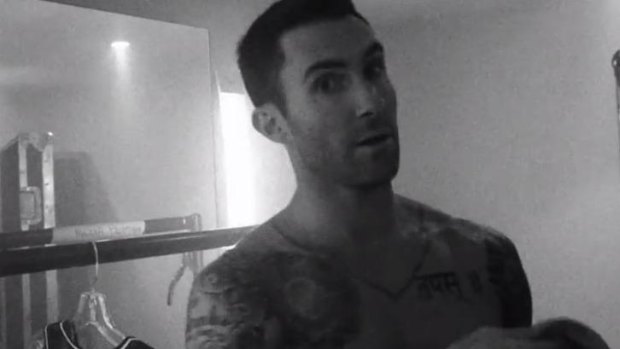 Steamy: Adam Levine in video for Maroon 5's <i>This Summer's Gonna Hurt Like A Motherf...er</i>.