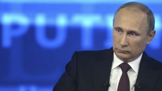 "Evasive" on surveillance : Russian President Vladimir Putin takes part in a live broadcast nationwide phone-in in Moscow.