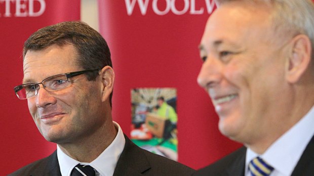 Pay cut: Michael Luscombe (right) will retire after five years in the top job, to be replaced by Grant O'Brien.