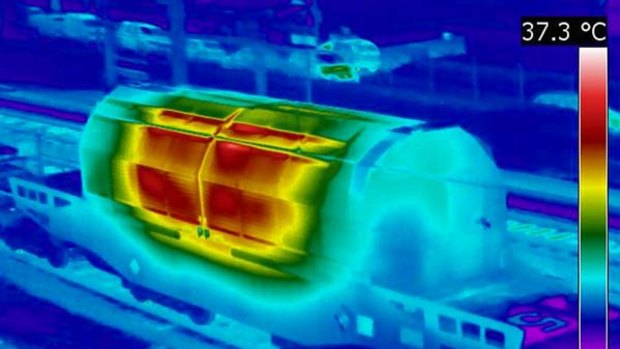 "Train from hell"... a thermography image shows a nuclear transport container at a rail yard in Valognes, Normandy.
