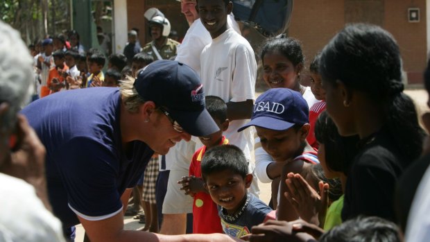 Shane Warne visiting a tsunami refugee camp in southern Sri Lanka in 2005. The Shane Warne Foundation donated money to the aid effort. 