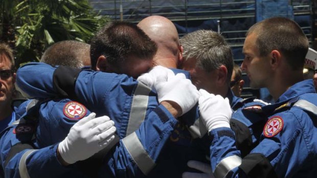 Emotional tribute ... hundreds of people, including paramedics and members of the Special Casualty Access Team, paid their respects to paramedic Michael Wilson.