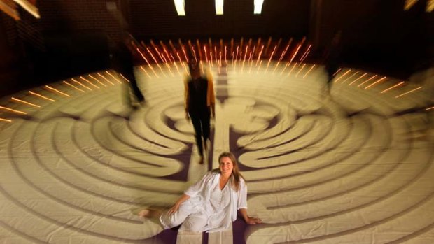 Mapped out ... Emily Simpson, with a scale model labyrinth at Mosman Art Gallery, is part of a worldwide push to have the paths built in public spaces for meditation.