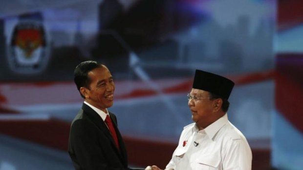 Joko  Widodo (left) with his opponent  in the presidential election Prabowo Subianto.
