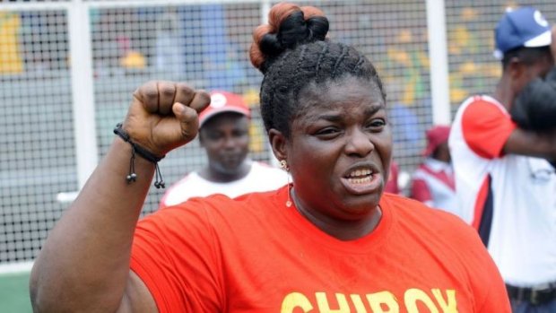 Fidelis Olubukola, a member of the Civil Society, Women Advocate Research and Documentation Centre, chants slogans for the release of the schoolgirls kidnapped by Boko Haram more than two weeks ago at a rally in Lagos, Nigeria.
