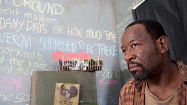 Writing's on the wall ... Morgan (Lennie James) returns a little unhinged in season three of <i>The Walking Dead</i>