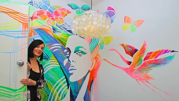 ''Edgy and urban'' &#8230; Shannon Crees with the art work she painted for interior designer Melissa Collison.