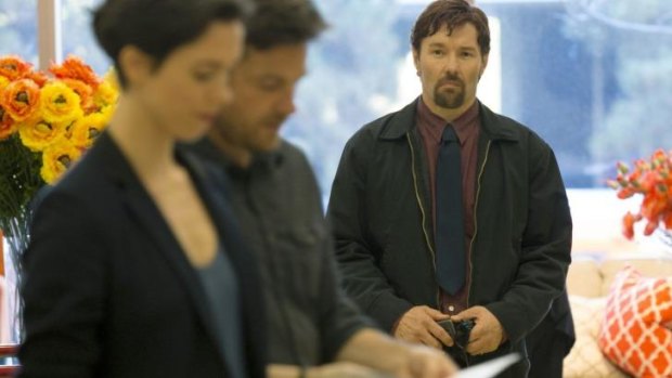 Joel Edgerton (right), with Rebecca Hall and Jason Bateman and in <i>The Gift</i>.